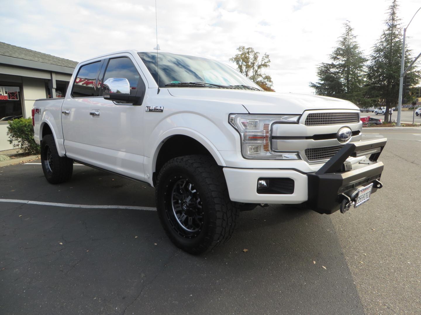 2019 White /BLACK INT W/DARK MARSALA LT Ford F-150 Platinum SuperCrew Cab 4WD (1FTEW1E45KF) with an 3.5L V6 ECOBOOST engine, 10-SPEED AUTO W/TOW MO transmission, located at 2630 Grass Valley Highway, Auburn, CA, 95603, (530) 508-5100, 38.937893, -121.095482 - F150 Platinum featuring a level kit, Fuel Offroad wheels, Toyo AT2 tires, Barricade Front winch bumper, Smittybilt winch, LED light bar, Undercover Ultraflex bedcover, and a Cargo Glide bed system. - Photo#2